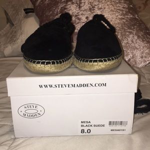 Black suede strap ups.